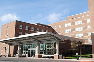 The Aleda E. Lutz VA Medical Center, a large tan building.