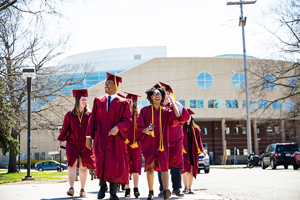 Graduates walking on campus
