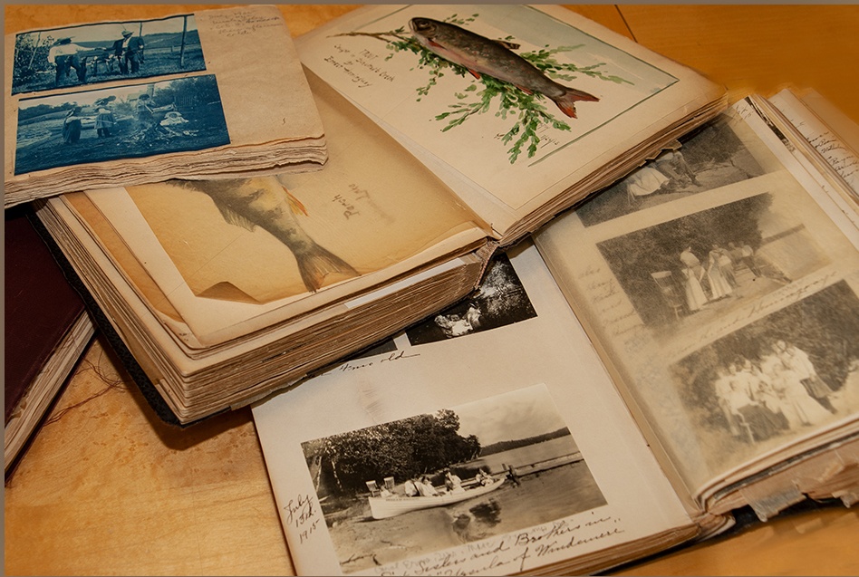 Hemingway books full of family photos and drawings