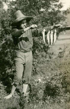 Ernest proudly showing his day's catch  Image courtesy of Jim Sanford and Clarke Historical Library