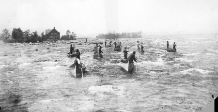 Fisherman in rapids