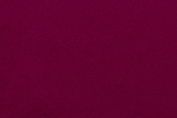 Maroon background with slight texture.