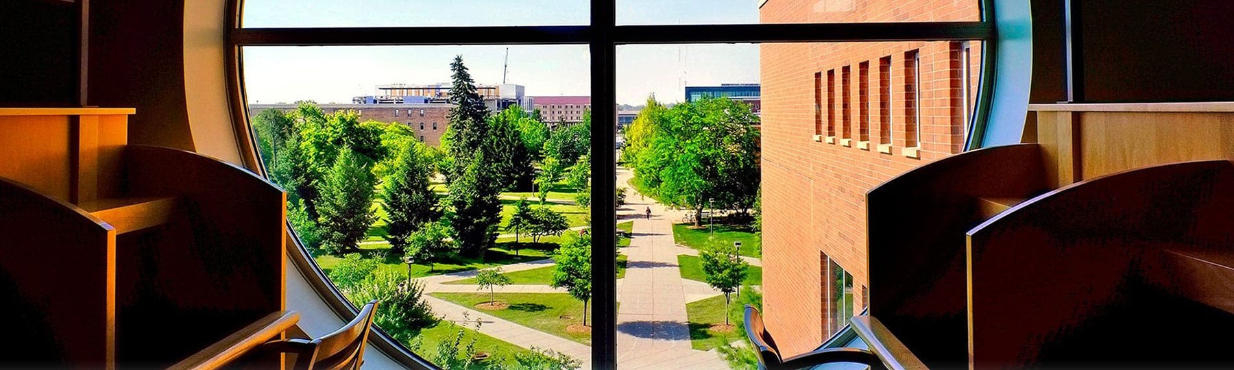 Image out one of the circular windows on the 4th floor of the Library.