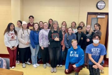 a group of people posing for a photo