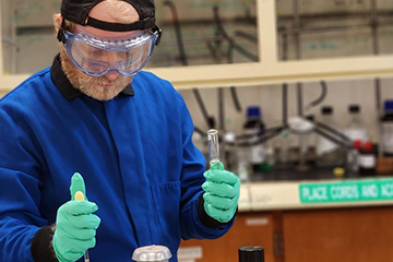 Photo of Lentz working in the lab