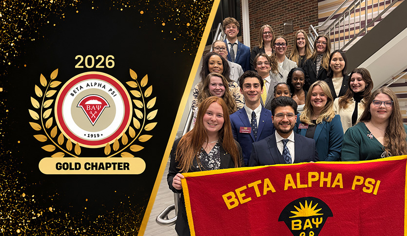 Beta Alpha Psi Eta Epsilon Chapter members pose with their chapter banner beside the 2026 Gold Chapter recognition.