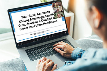 A person looks at a laptop screen that shows CMU speakers and a slide that reads From Study Abroad to Lifelong Advantage: Small-Group Travel as a Catalyst for Career and Future Readiness.