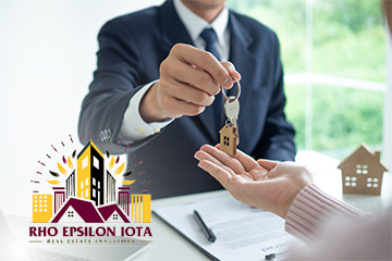 A Rho Epsilon Iota logo with the group's name and a vector image of home roofs with skyscrapers in the background in CMU colors sits in the lower left of a photo of a man in a suit handing a house key to a woman's open hand.
