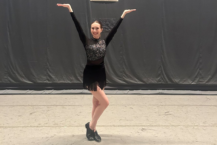 CMU student Hannah Beardsley, a human resources and dance studies double major, poses in her a black sparkly dance attire while balancing her passion for performance and business leadership.
