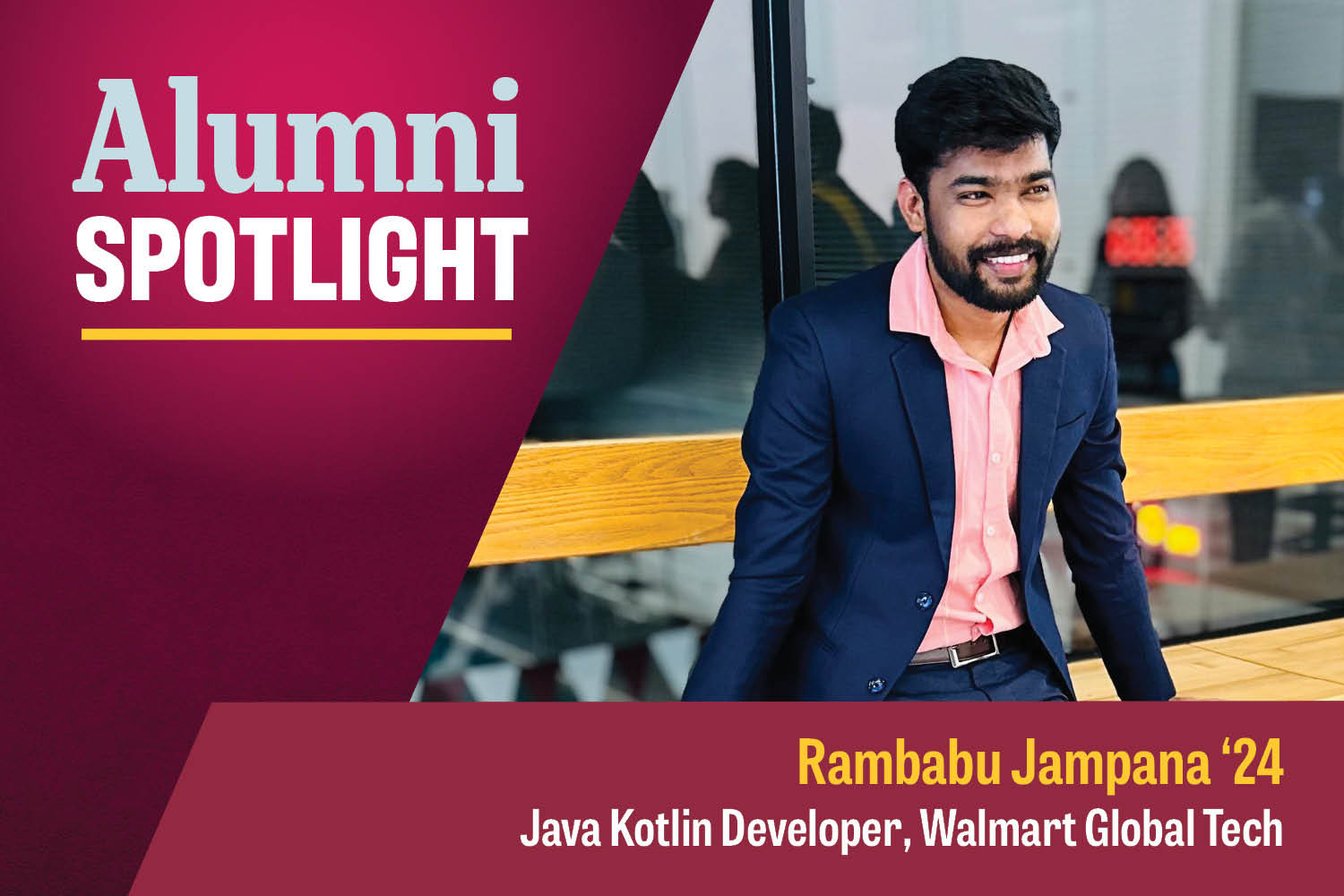 Alumni Spotlight: Rambabu Jampana '24, Java Kotlin Developer, Walmart Global Tech. Jampana sits on a wooden ledge in front of a large interior window. He is looking into the distance and smiling. He wears a dark blue suit, a salmon shirt and brown belt.