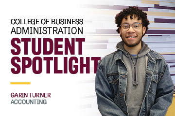 Image text: College of Business Administration Student Spotlight Garin Turner Accounting. Image: Garin has curly hair, a short beard and glasses. He's wearing a gray hoodie with a jean jacker.