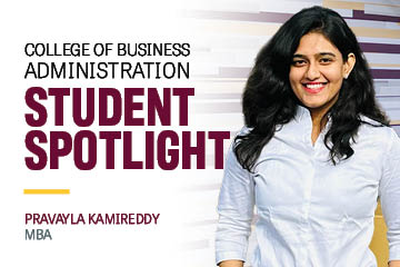 Image text: College of Business Administration Student Spotlight Pravayla Kamireddy MBA. Image: Pravalya wears a white button down shirt. She has long dark thick hair and she smiles warmly at the camera.