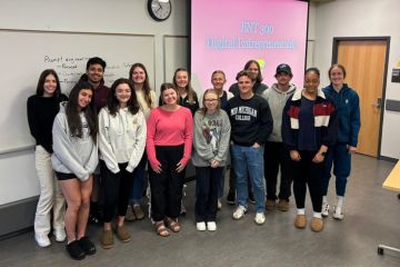 A group of 14 ENT 300 Digital Entrepreneurship students pose for a group photo in a CMU classroom in Grawn Hall.