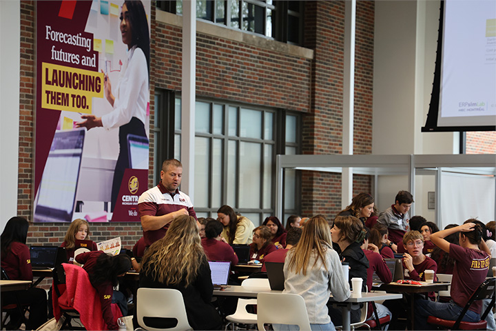 High school students play the ERPsim game.