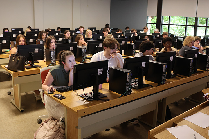 The SAP lab is full of students eager to start learning. Every workstation is full as students stare into lit screens.