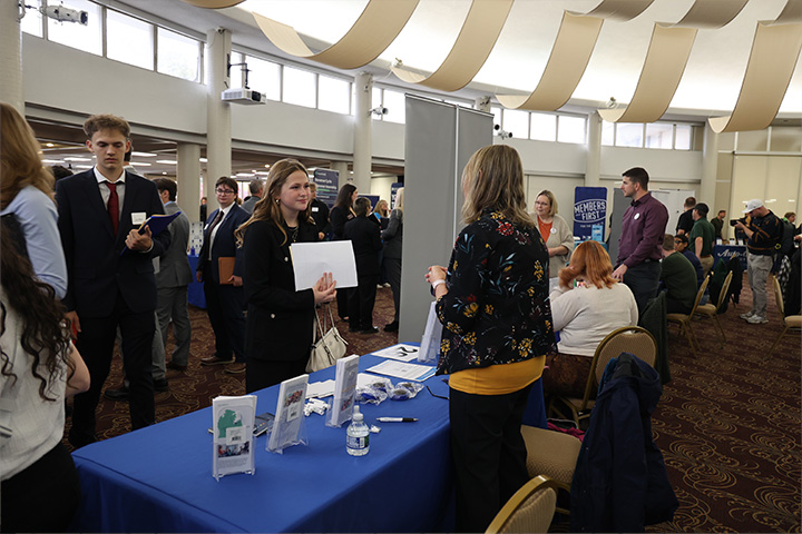Students speak with recruiters at the All Majors Career Fair