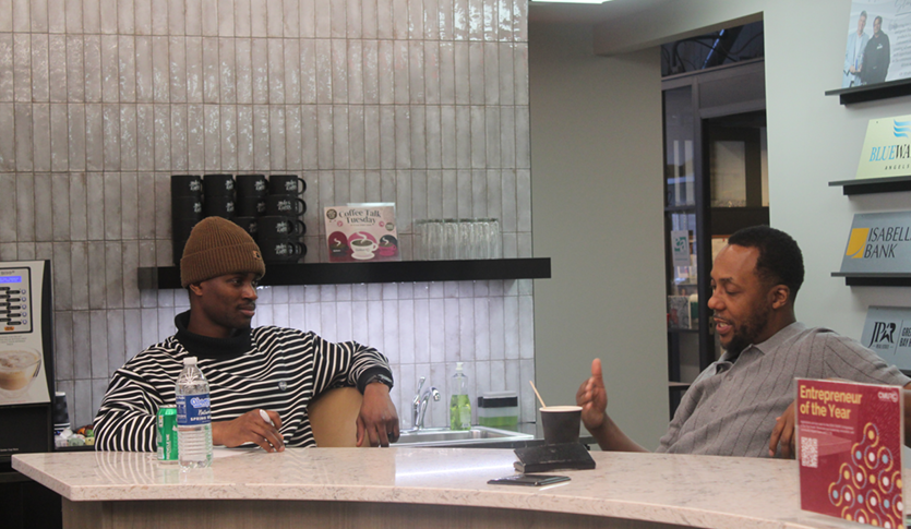 Dr. Cleamon Moorer talking to a student at an NVC Mentor Meetup at the CMURC