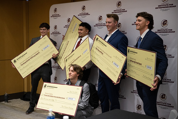 A group photo of winners from the 2024 New Venture Challenge event.