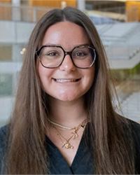 A professional headshot of Kennedy Hoppa