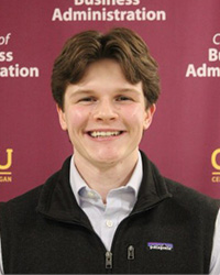 A professional headshot of Miles Medley.