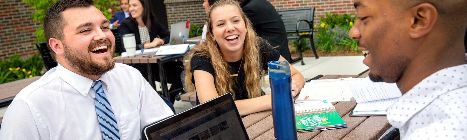 People laughing at a table