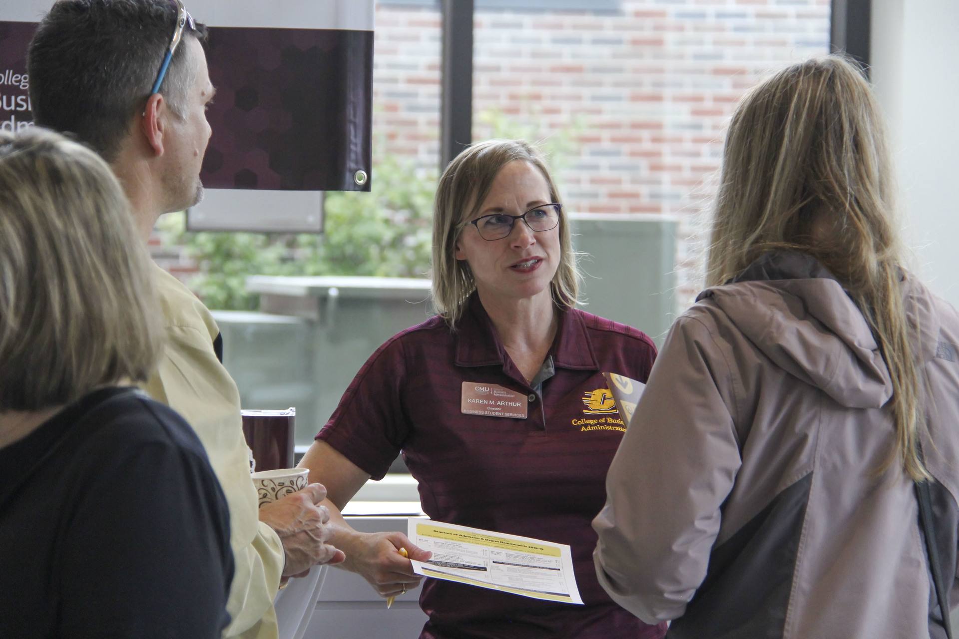 Advisors advising potential CMU student and their parent