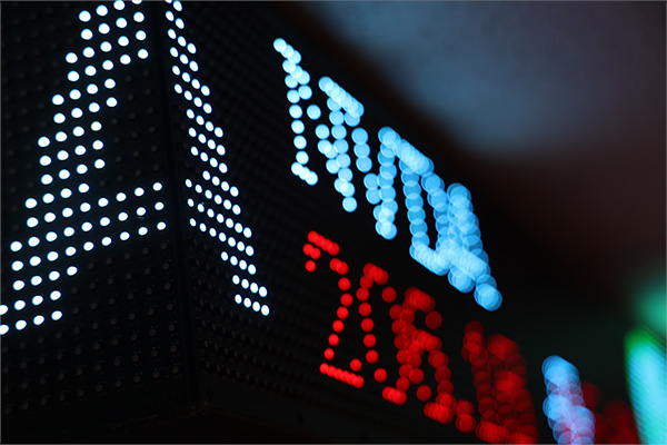 An extreme closeup of the stock ticker outside of the Voigtman Financial Lab in Grawn. The sticker symbol for Nvidia can be made out in the image.