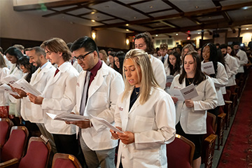 23 white coat reading lft - thumbnail