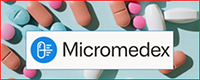 The Micromedex logo featuring white box over a field of pills with Micromedex in black