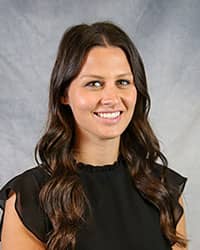 Headshot of Kelsey Kershaw wearing a black blouse.