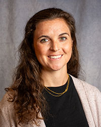 Bucksbaum, Caitlin Caitlin Bucksbaum has long brown hair smiling