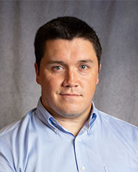 Evans, Daniel Daniel Evans is wearing a blue button down shirt.