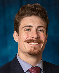 Lahr, Nathaniel a man with a mustache smiling