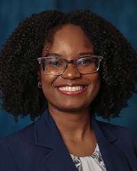 Lewis, Ryanne a woman wearing glasses and a blue blazer