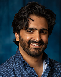 Neriya, Sameer a man with a beard smiling