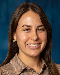 a woman smiling at the camera