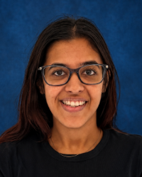 Vatse, Medha a woman wearing glasses and smiling