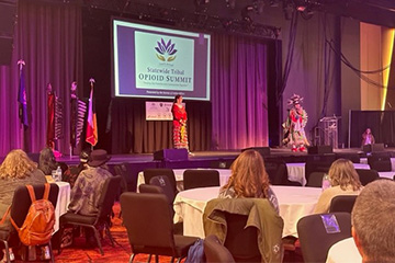 Native American presenters on stage at Tribal Opioid Summit.