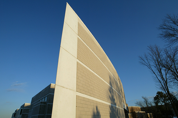 Side view of the School of Music building at sunset