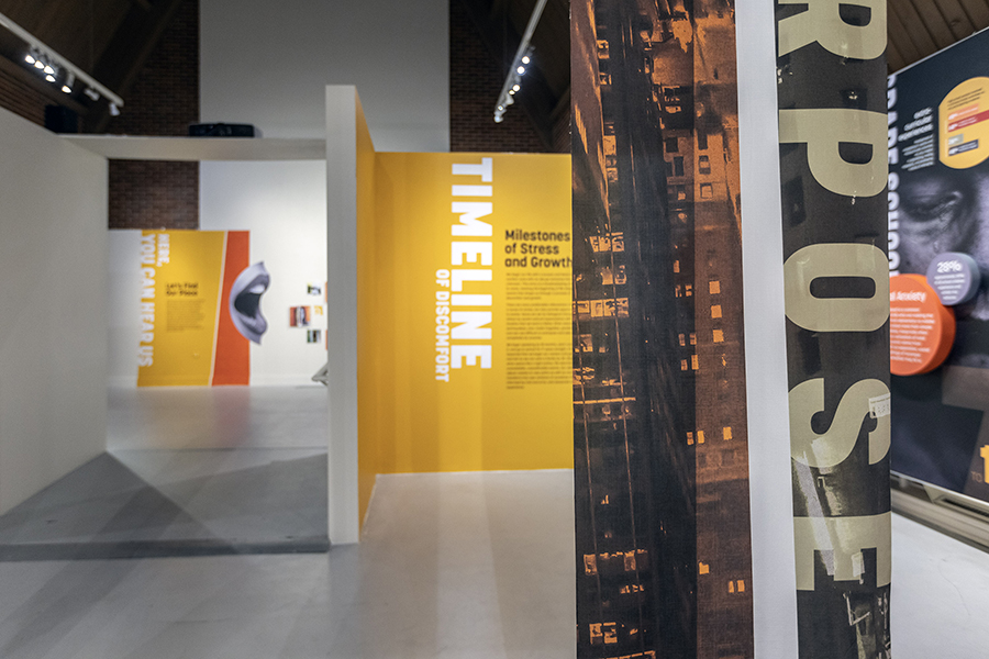 The University Art Gallery main room. There is a graphic design exhibit in the space.