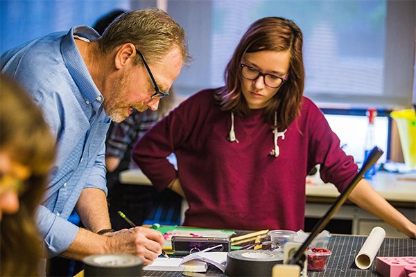 Animation professor Steve Leeper working with a student