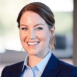 Headshot of Jessica Wagner. She is in front of a window, giving the image a natural light look.