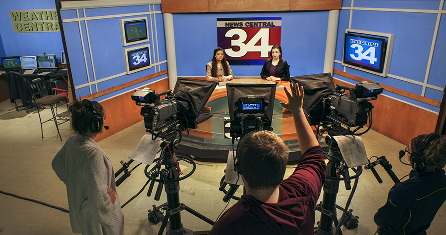 Students working on news broadcast