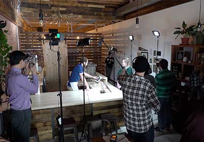 BTS of students on the film set for their BCA 521 class project.