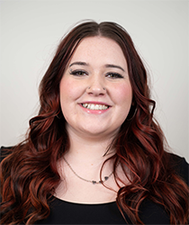 Headshot of Zoey Lawrence in front of a white backdrop