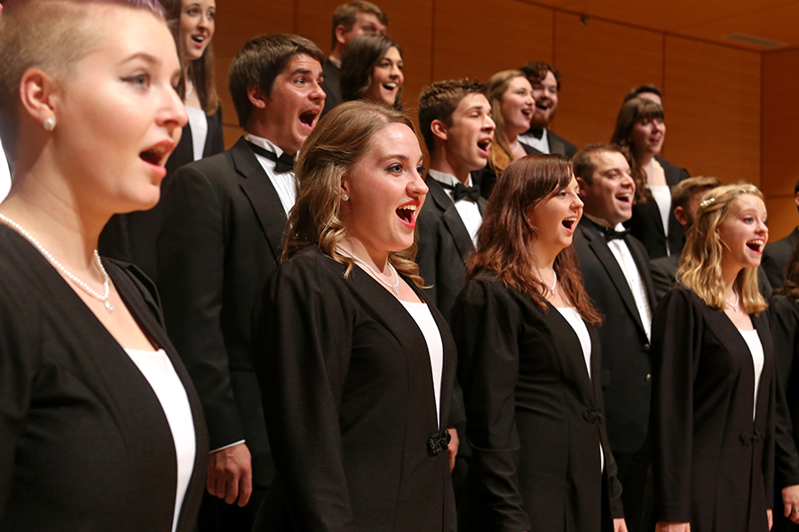 CMU choir ensemble all assembled together singing