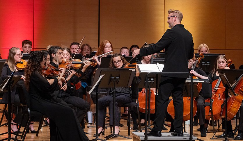 The CMU Symphony Orchestra performing in Staples Family Concert Hall.
