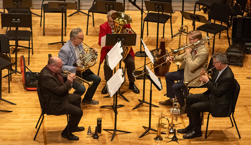 The CMU Faculty brass quintet performing in Staples Family Concert Hall.