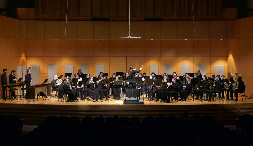 The CMU University Band performing in Staples Family Concert Hall.