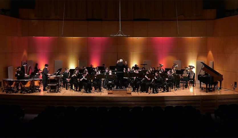The CMU Wind Symphony performing in Staples Family Concert Hall under the direction of Dr. James Batcheller.
